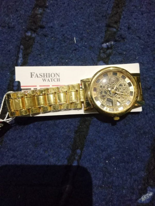 Golden New Look Luxury Analog Skeleton Quartz Stainless Steel Watch For Men & Boys (without Box )